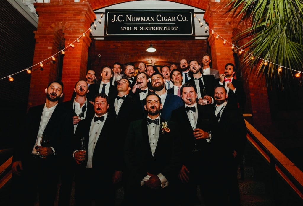 Group of men with cigars at J.C. Newman Cigar Co.