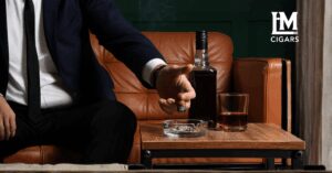 Man about to put out cigar